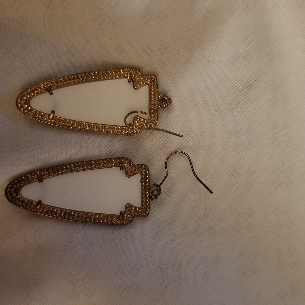 White dangle earrings